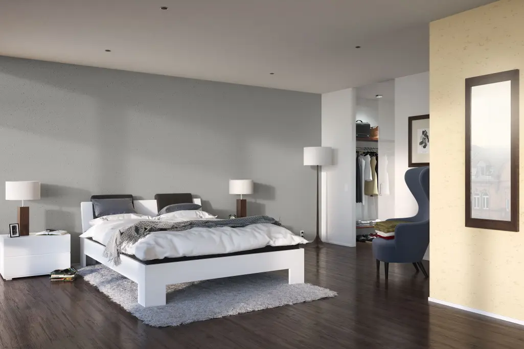 soveværelse med pudsede vægge