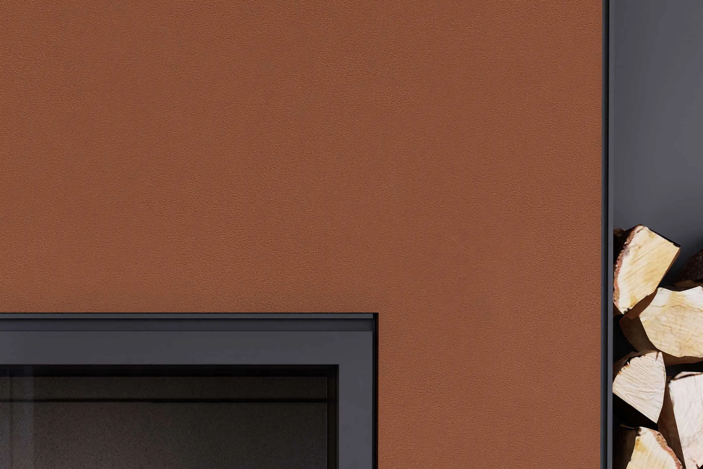 Living space, close-up of firewood and fireplace, wall area painted in a red-brown colour shade from